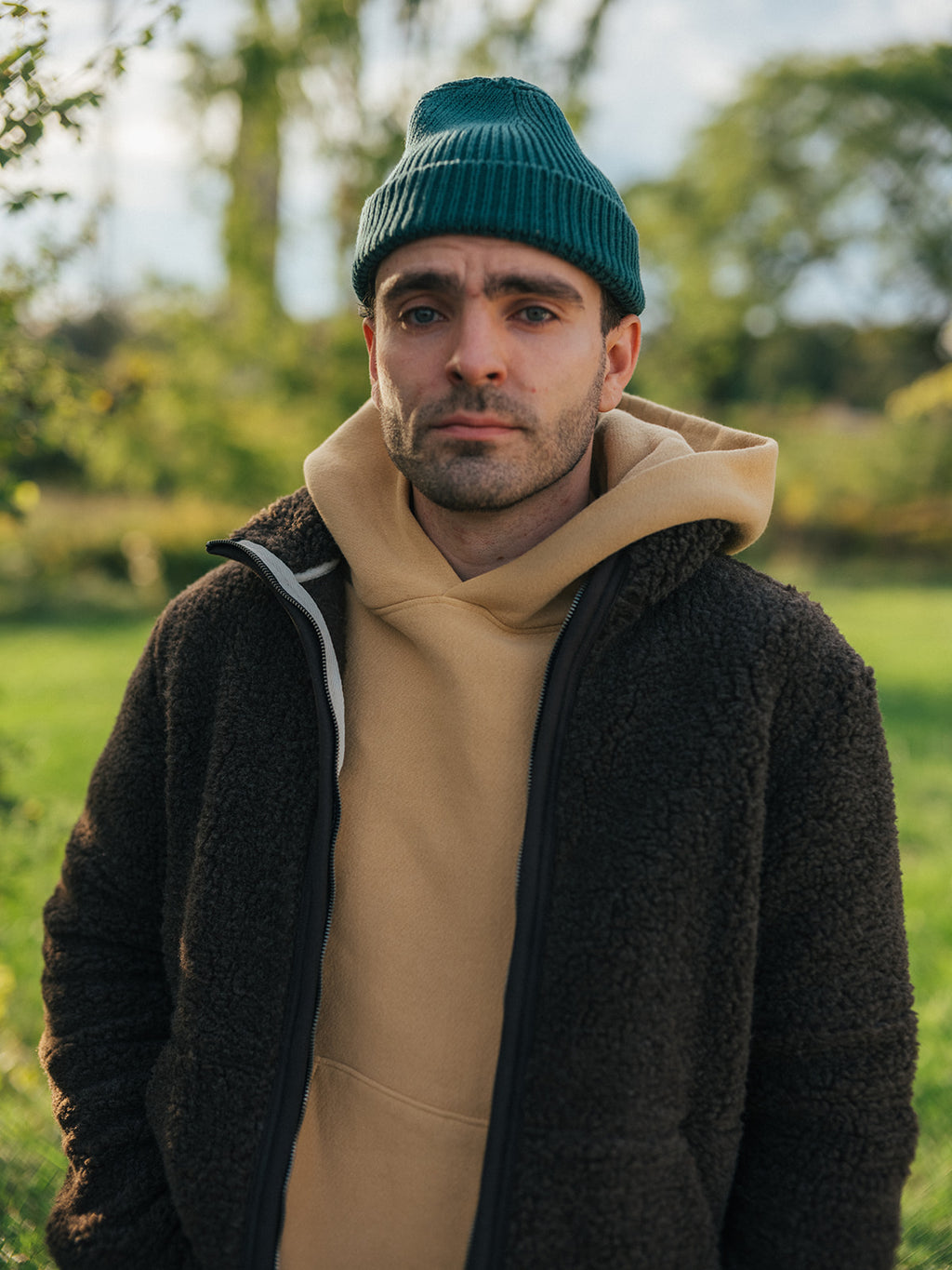 Classic Hoodie in Dijon with Cotton Cuff Beanie in Pine Needle, Fall 2026 lifestyle